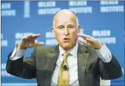  ?? RINGO H. W. CHIU/ ASSOCIATED PRESS ?? Gov. Jerry Brown on Wednesday announced tough, new goals for reducing greenhouse gas emissions during the Milken Institute Global Conference in Beverly Hills.