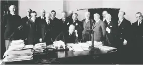  ?? NATIONAL ARCHIVES OF CANADA ?? The Farmers’ Creditors Arrangemen­t Act was Prime Minister R.B. Bennett’s answer to resolving the impasse between farmers who owed money and those who had lent to
them. Bennett is surrounded by members of his cabinet above.