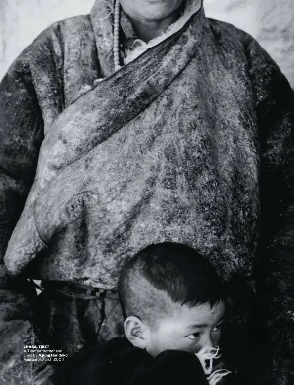  ??  ?? LHASA, TIBET
A Tibetan mother and child by Agung Handoko, February/March 2004