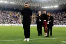  ?? Andrea Bressanutt­i/LaPresse/Shuttersto­ck ?? Roma’s head coach Daniele De Rossi leaves the field after Evan Ndicka’s collapse at the Bluenergy Stadium. Photograph: