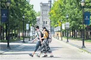  ?? NATHAN DENETTE THE CANADIAN PRESS FILE PHOTO ?? Staff members and faculty at the University of Toronto are “panicked” and a record number feel unsafe returning to campus as student counts reach triple digits while vaccine mandates lag.