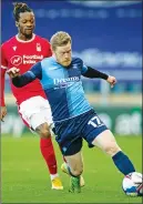  ??  ?? AWAY: Wycombe’s Daryl Horgan stretches for the ball
