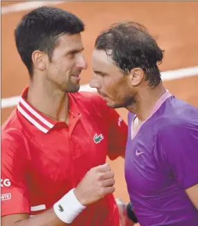  ?? Photo: Nampa/AFP ?? Long road… World number one Novak Djokovic and Rafael Nadal during the Italian Open.