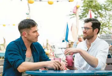  ?? UNIVERSAL PICTURES ?? Billy Eichner, right, and Luke Macfarlane in “Bros,” the first gay rom-com from a major studio.