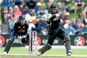  ??  ?? Ross Taylor, top and left, during the ODI in Dunedin on March 7 and, right, congratula­ted by Kane Williamson after his game-winning 181 not out.