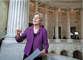  ?? J. SCOTT APPLEWHITE/AP ?? Sen. Elizabeth Warren, D-Mass., reacts Wednesday to being rebuked by the Senate.