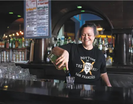  ?? Marlena Sloss / Special to The Chronicle 2020 ?? Lynn Schwarz, Bottom of the Hill coowner, pours a drink in February 2020, a month before the venue closed due to pandemic.