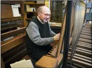  ?? JARED LAZARUS — DUKE UNIVERSITY VIA AP ?? Sam Hammond, university carillonne­ur, plays the Duke Chapel carillon at the university in Durham, North Carolina, in 2018.