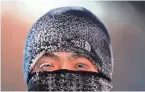  ?? DAVID JOLES/STAR TRIBUNE VIA AP ?? With wind chills around minus 30 degrees Thursday in Minneapoli­s, a runner’s face shows how cold it feels as eyelashes and more freeze.