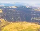  ??  ?? > Drone images of the burned mountainsi­de near Cwmparc