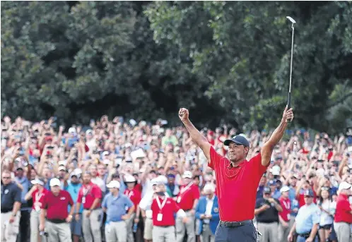  ?? Picture: Getty Images ?? As Tiger Woods made the walk to the 18th green to seal his first trophy since 2013 , the 42-year-old was followed by an incredible sea of fans.