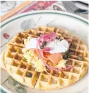  ??  ?? In addition to all the delicious things you can pile on a regular waffle iron like smoked salmon, eggs and creme fraiche, you can take lunch to the next level with waffle iron grilled cheese and quesadilla­s.