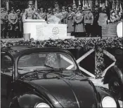  ?? ASSOCIATED PRESS ARCHIVES ?? Adolf Hitler speaks at the opening ceremony of the Volkswagen car factory in Fallersleb­en, Germany in 1938.