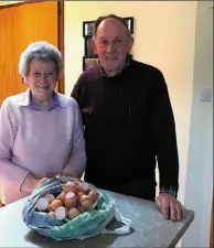  ??  ?? Jim Byrne from Ballindagg­in with their egg shells that o decorate their May Bush.