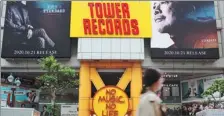  ?? RITSUKO ANDO / REUTERS ?? Tower Records’ stores in Japan, such as this one in Tokyo’s Shibuya district, have been struggling in the pandemic.