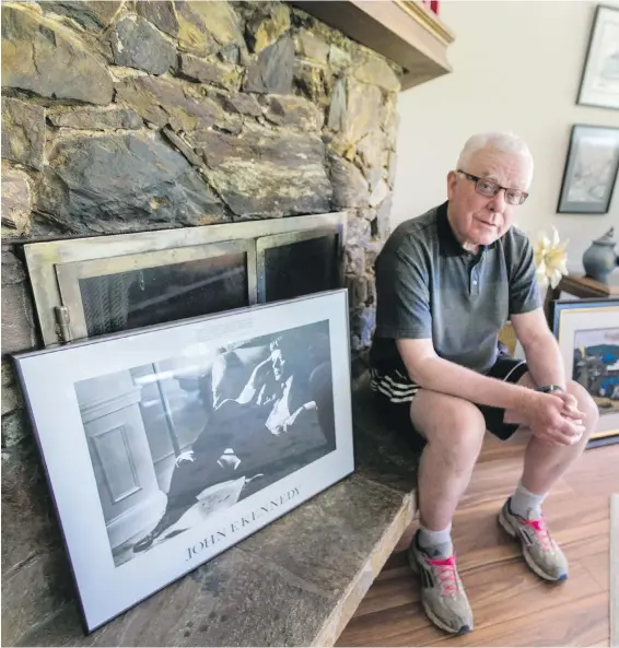  ??  ?? Retired prosecutor Scott Van Alstine at his home in Sidney, with a photo of one of his heroes, former U.S. president John F. Kennedy.