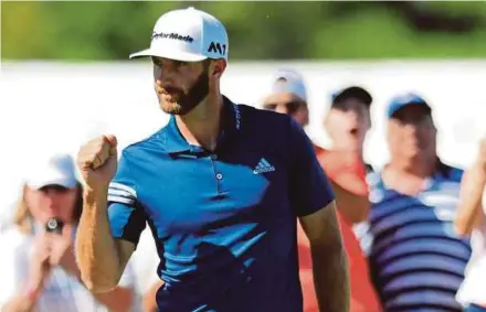  ?? AFP PIC ?? Dustin Johnson reacts after putting for birdie on the 15th hole of his round five match in the World Golf Championsh­ips Match-Play Championsh­ip.