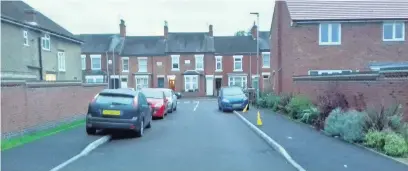  ??  ?? Pictured are cars parked both sides of the road in Wicket Close. Coun Paul Mercer told the Echo he believes the cars predominat­ely belong to students.