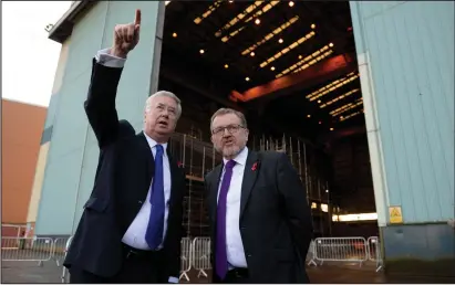  ??  ?? Defence Secretary Sir Michael Fallon, pictured left with David Mundell MP, has revealed plans for the new fleet of warships