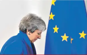  ?? Emmanuel Dunand/AFP ?? Theresa May, primeira-ministra britânica: “Não me sinto triste; estamos deixando a União Europeia, não a Europa”