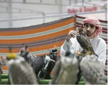  ?? Mona Al Marzooqi / The National ?? Adihex celebrates traditiona­l Emirati sports such as falconry to keep simpler times alive