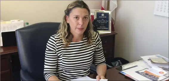  ??  ?? In this Dec. 21 photo, Florida State Rep. Emily Slosberg poses for a photo at her office in Deerfield Beach, Fla. Slosberg is the lead sponsor of a bill that would strengthen the state’s ban on texting while driving. Florida is one of the last states...