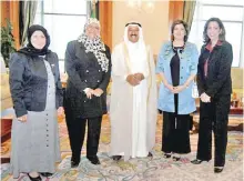  ??  ?? KUWAIT: In this file photo, His Highness the Amir Sheikh Sabah Al-Ahmad Al-Jaber Al-Sabah (center) poses with Dr Maasouma Al-Mubarak (second from left), Dr Salwa Al-Jassar (far left), Dr Aseel Al-Awadhi (second from right), and Dr Rola Dashti (far...