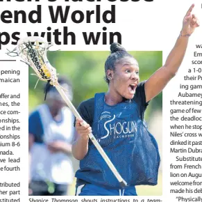  ?? GLADSTONE TAYLOR/MULTIMEDIA PHOTO EDITOR ?? Shanice Thompson shouts instructio­ns to a teammate as she runs towards the D in a training session for the national Under-19 women’s lacrosse team at Wolmer’s High School for Girls earlier this year.