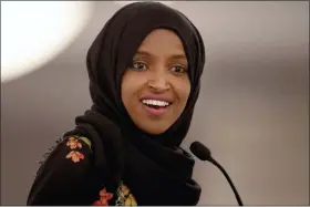  ?? NICK WAGNER — AUSTIN AMERICAN-STATESMAN VIA AP, FILE ?? In this file photo, Rep. Ilhan Omar, D-Minn., speaks during the fourth annual Citywide Iftar Dinner in Austin, Texas. In tweets Sunday, President Donald Trump portrays the lawmakers as foreign-born troublemak­ers who should go back to their home countries. In fact, the lawmakers, except one, were born in the U.S. He didn’t identify the women but was referring to Reps. Alexandria Ocasio-Cortez, Ilhan Omar, Ayanna Pressley and Rashida Tlaib.