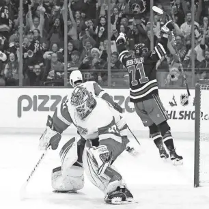  ?? JAMES CAREY LAUDER/USA TODAY SPORTS ?? Jets left wing Axel Jonsson-Fjallby celebrates his goal on Red Wings goaltender James Reimer in the second period Wednesday in Winnipeg, Manitoba.