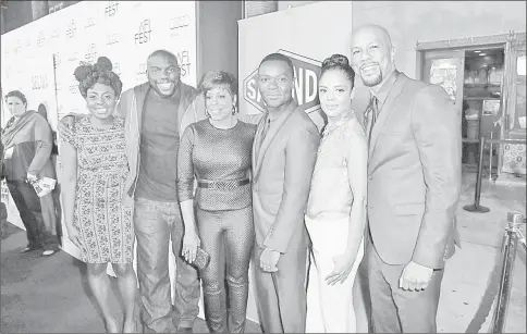  ??  ?? Cast members (left to right) Ledisi Young, Omar Dorsey, Niecy Nash, Oyelowo, Tessa Thompson and Common pose at a screening of ‘Selma’ during AFI Fest 2014 in Hollywood, California on Tuesday. (Left) Oyelowo and wife actress JessicaOye­lowo pose at the screening. — AFP photos