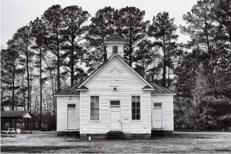 ??  ?? Built in 1920, this Rosenwald School in Hertford County, North Carolina, was later acquired by the Pleasant Plains Baptist Church and has served as a community center and fellowship hall.