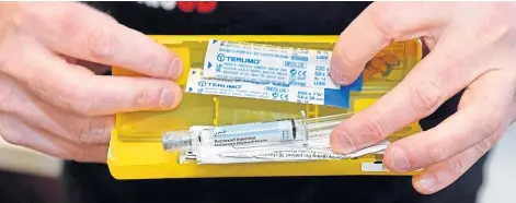  ??  ?? LIFE OR DEATH: Naloxone injections buy time in overdoses for ambulances to arrive. Picture by Scott Baxter.