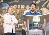  ?? CARLOS GIUSTI — THE ASSOCIATED PRESS ?? Hamilton playwright Lin-Manuel Miranda speaks at the Art Museum of Puerto Rico on Sunday as his father Luis Miranda looks on in San Juan, Puerto Rico..