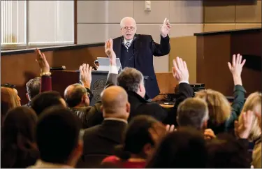  ?? PHOTO BY JACQUELINE RAMSEYER ?? John Dean, President Richard Nixon’s White House counsel during the Watergate scandal, asks the audience how many were alive during the scandal at a discussion on ethics at the Isaac Newton Senter Auditorium in San Jose on Tuesday.