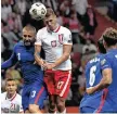  ?? PIOTR NOWAK EPA-EFE ?? ENGLAND in action against Poland during their FIFA World Cup 2022 qualifying Group I soccer match in Warsaw, Poland.
|