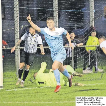  ?? ?? Noah Daley was the hat-trick hero for Carmarthen Town against Swansea University. Picture: Gareth Hughes