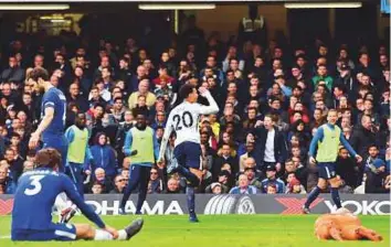  ?? AFP ?? ■ Chelsea look down and out after Tottenham Hotspur’s Dele Alli scores their third goal in an EPL match that left the Blues eight points adrift of Champions League qualificat­ion places.