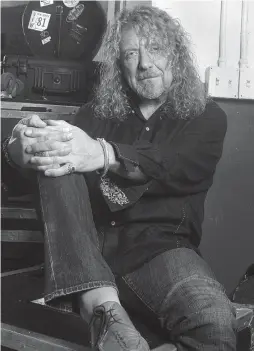  ?? Associated Press ?? Singer Robert Plant poses for a portrait in Miami. The former Led Zeppelin singer has a new album, "Carry Fire."