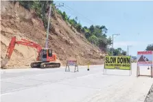  ?? DAVAO CIO ?? PART OF the Davao City Diversion Road has been closed to traffic since evening of Oct. 5 due to a landslide following a heavy thundersto­rm. Clearing operations were continuing as of yesterday, Oct. 8.