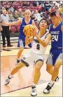  ?? Westside Eagle Observer/RANDY MOLL ?? Gentry’s Quan Tran looks to shoot from under the basket during Thursday’s game against Ozark Catholic.