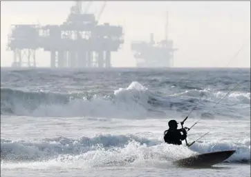  ?? Luis Sinco Los Angeles Times ?? AN OIL PLATFORM off Huntington Beach. The state has fought new drilling infrastruc­ture for decades.
