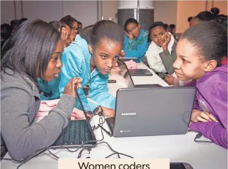  ?? KEN MOORE ?? Girls from the national nonprofit Black Girls Code get an introducto­ry coding lesson at Google New York offices.