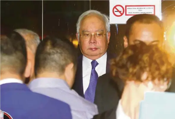  ??  ?? Datuk Seri Najib Razak at the Kuala Lumpur High Court for case mention yesterday. PIC BY MOHAMAD SHAHRIL BADRI SAALI