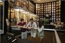  ?? CONTRIBUTE­D BY DAVID MEANY / CONTIKI PURCHASE/ MEMPHIS CONVENTION & VISITORS BUREAU ?? The Record Room at Graceland features Elvis Presley’s gold records along with many other artifacts from the singer’s career.