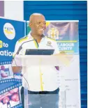  ?? ?? Minister of Labour and Social Security Pearnel Charles Jr makes his presentati­on at the PATH Town Hall meeting at the St Gabriel’s Anglican Church Hall, May Pen, Clarendon, on Wednesday, March 13.