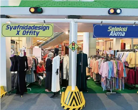  ??  ?? Visitors will be spoilt for choice with the array of stylish baju Raya available.