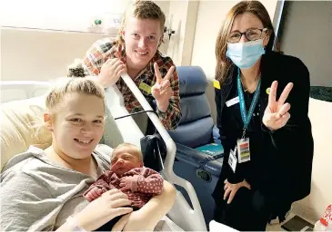 ??  ?? One of the first families to join the exciting GenV project at West Gippsland Hospital in Warragul are Chloe Walker Baxter and Jack Welch with baby Harper along with GenV recruiter Darien Jack.