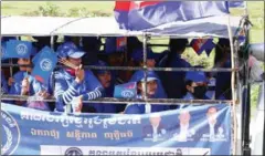  ?? HENG CHIVOAN ?? KNUP supporters join a rally this month in Phnom Penh.