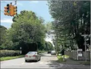  ?? TANIA BARRICKLO — DAILY FREEMAN FILE ?? Traffic moves along Washington Avenue in Kingston, N.Y., at the site of the former sinkhole.